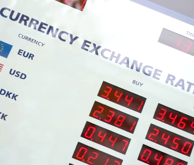 impact taux change budget voyage